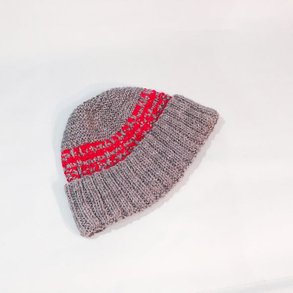 Grey beanie with red pattern