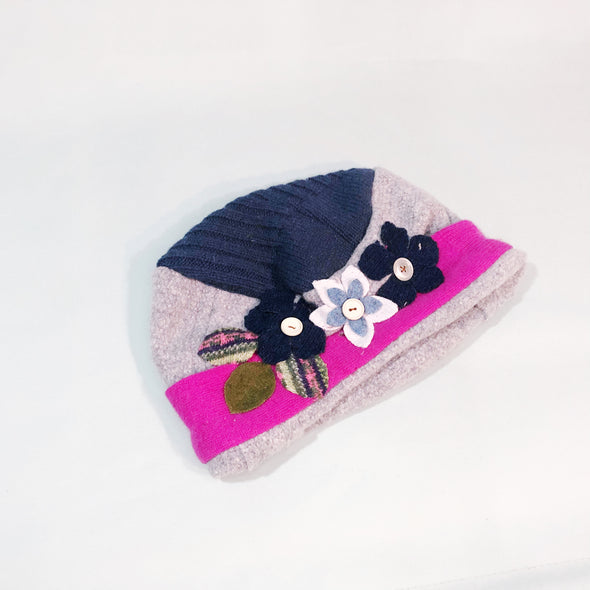 Grey and blue jumper hat with pink brim