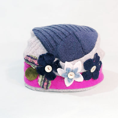 Grey and blue jumper hat with pink brim