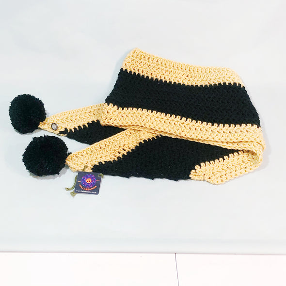 Crocheted pompom scarf